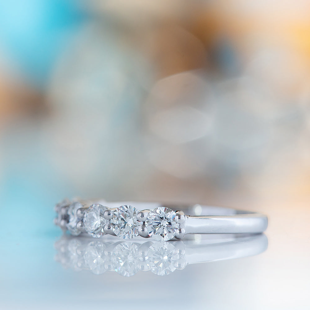 Seven, a Mined Diamond Half Eternity Ring