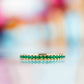 Emma, an Emerald Half Eternity Wedding Band - Victoria's Jewellery