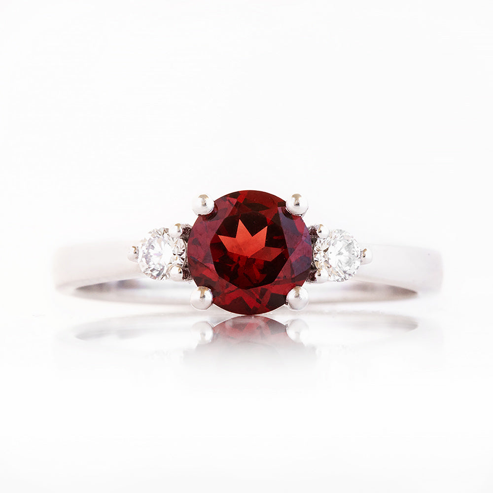 Lea, a Garnet and Lab Diamond Trilogy Ring