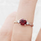 Lea, a Garnet and Lab Diamond Trilogy Ring