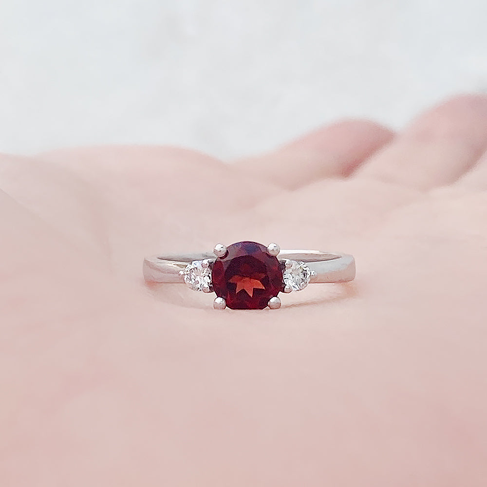 Lea, a Garnet and Lab Diamond Trilogy Ring