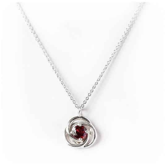 Freyja, a round cut Garnet Pendant