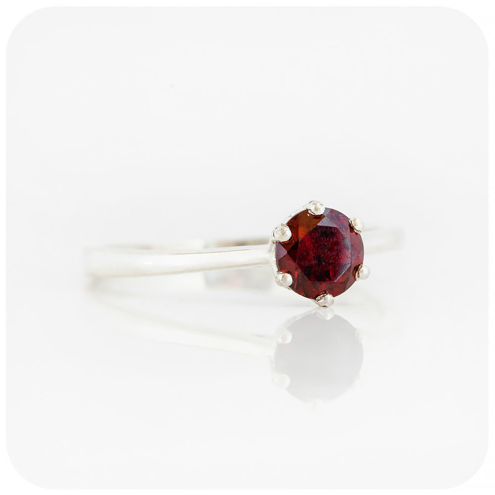 Tulip, a Six Claw Garnet Ring