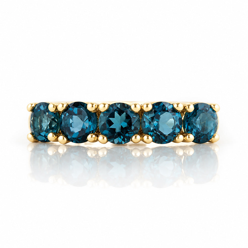 Annie, a London Blue Topaz Half Eternity Ring - Victoria's Jewellery