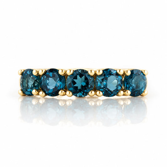Annie, a London Blue Topaz Half Eternity Ring - Victoria's Jewellery