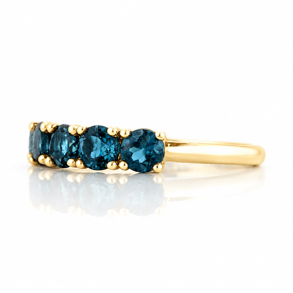 Annie, a London Blue Topaz Half Eternity Ring - Victoria's Jewellery