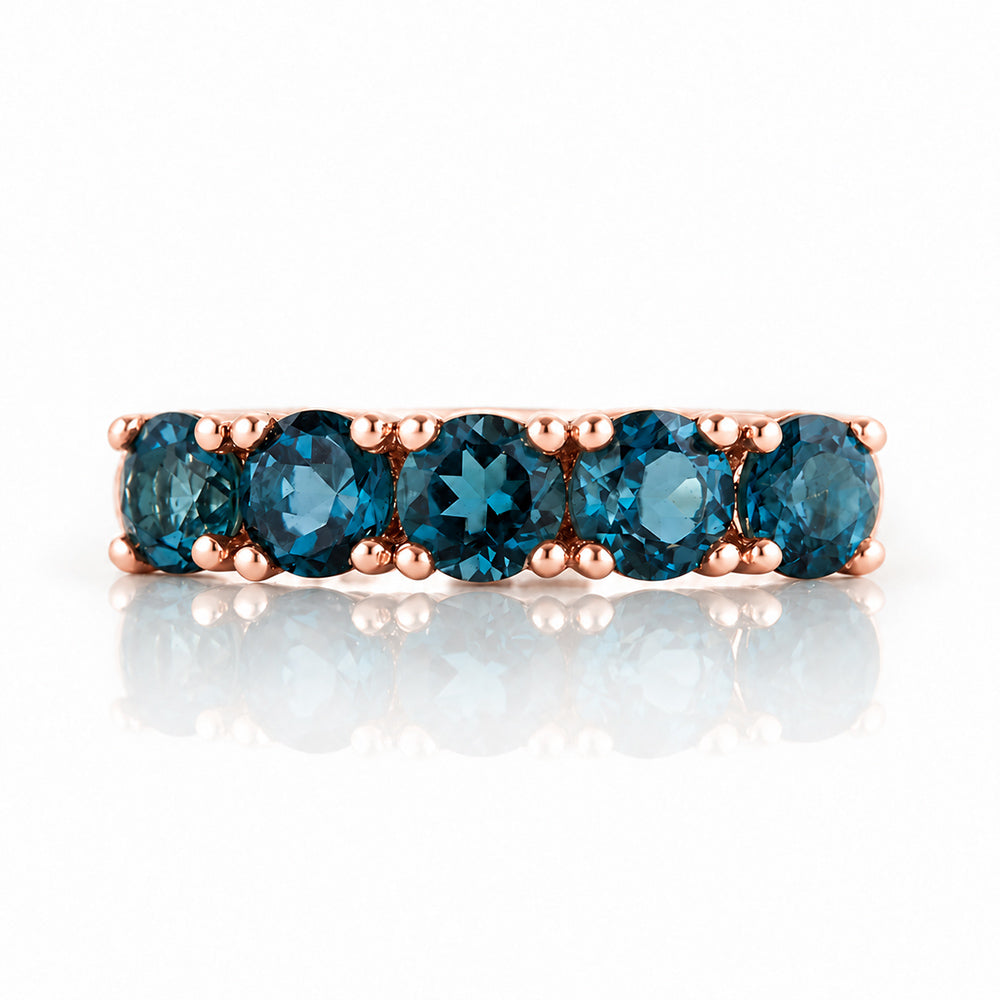 Annie, a London Blue Topaz Half Eternity Ring - Victoria's Jewellery