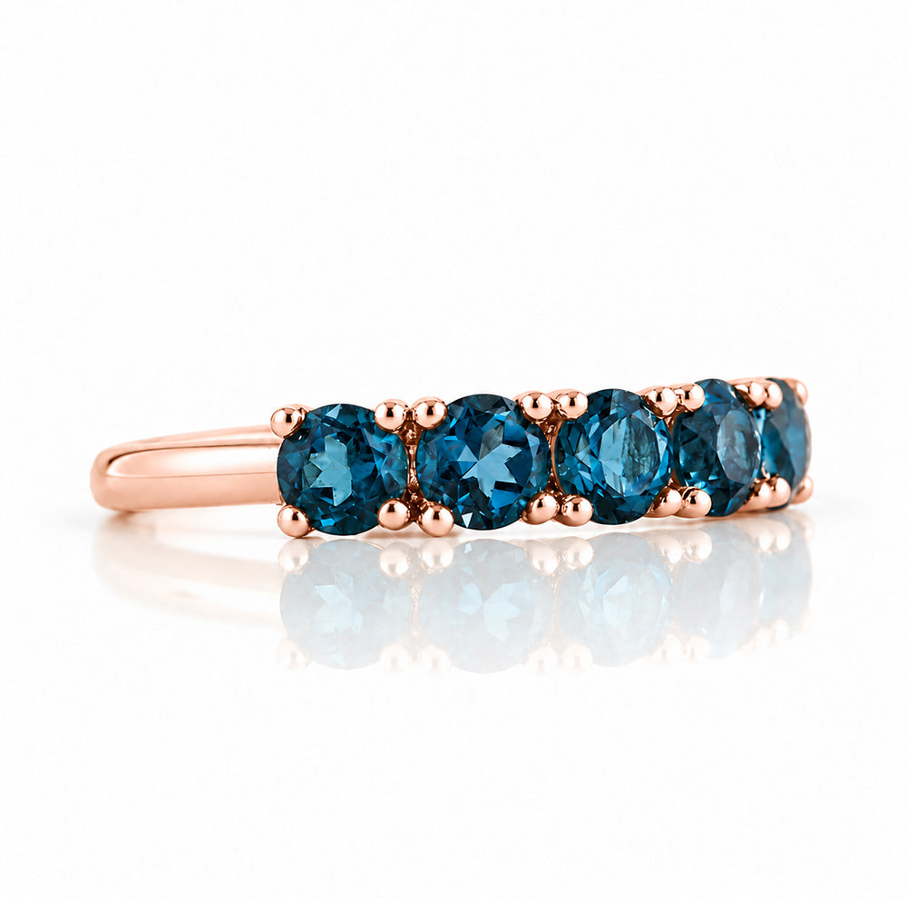 Annie, a London Blue Topaz Half Eternity Ring - Victoria's Jewellery