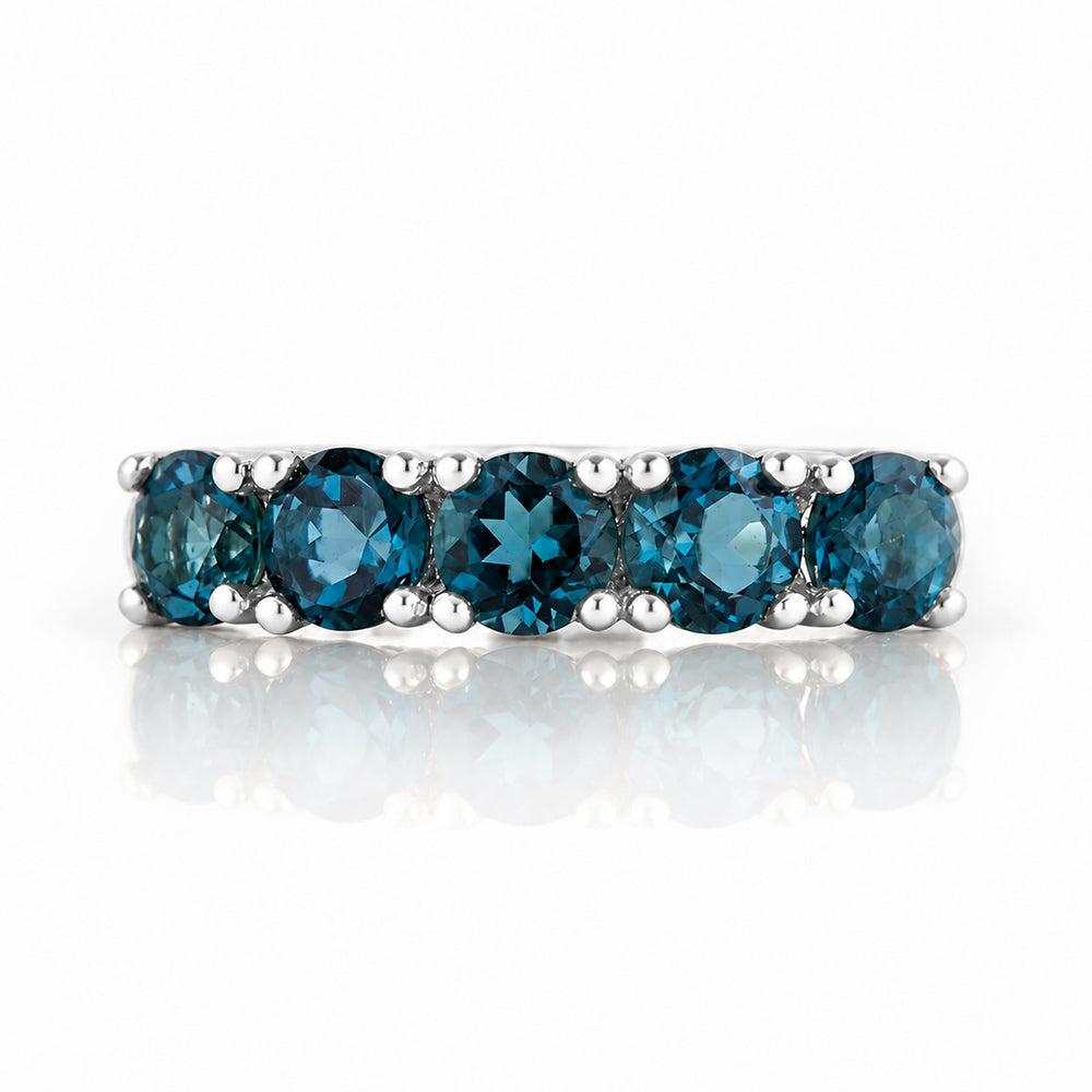 Annie, a London Blue Topaz Half Eternity Ring - Victoria's Jewellery