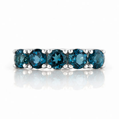 Annie, a London Blue Topaz Half Eternity Ring - Victoria's Jewellery