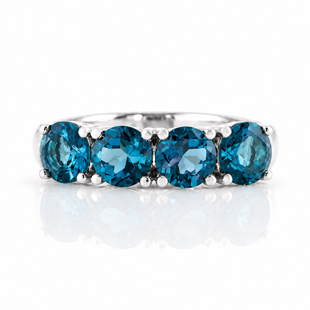 Celine, London Blue Topaz Half Eternity Ring