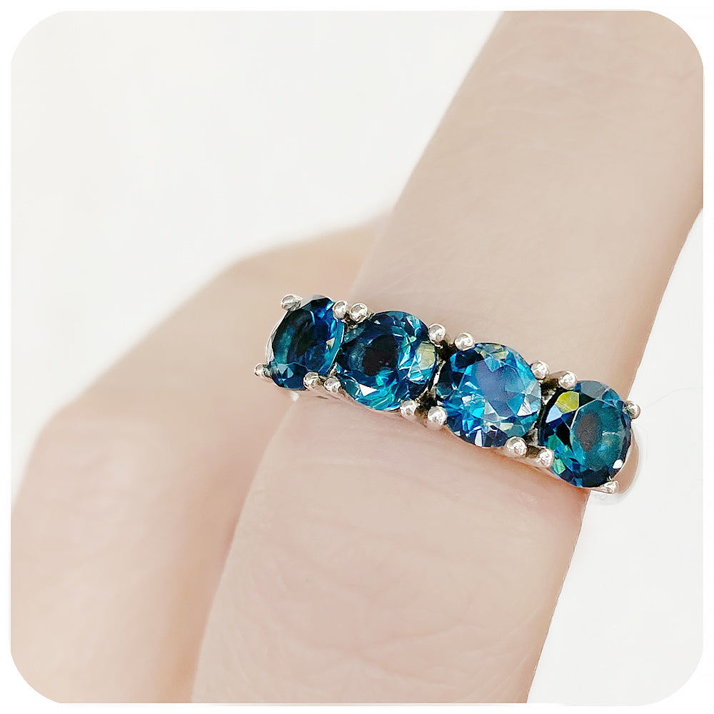 Round brilliant cut London Blue Topaz four stone Half Eternity Anniversary Ring - Victoria's Jewellery