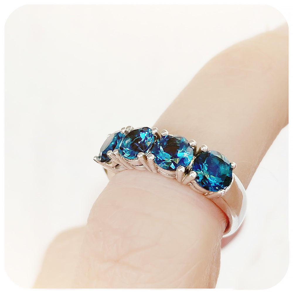 Round brilliant cut London Blue Topaz four stone Half Eternity Anniversary Ring - Victoria's Jewellery