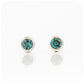 round cut blue london topaz stud earrings in a sterling silver bezel tube setting