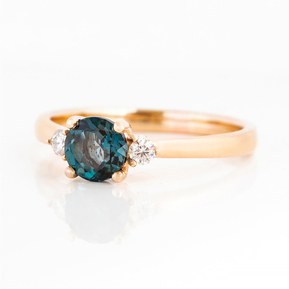 Round cut London Blue Topaz and Diamond Trilogy Engagement Ring in Rose Gold - Victoria's Jewellery