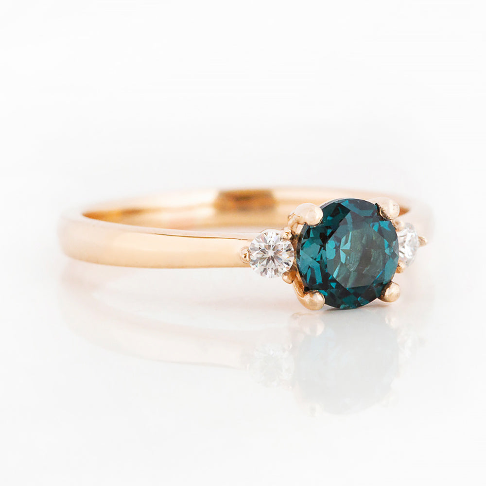 Round cut London Blue Topaz and Diamond Trilogy Engagement Ring in Rose Gold - Victoria's Jewellery