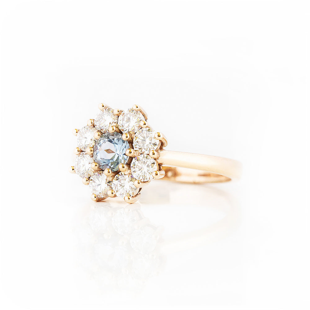 Fleur, a Moissanite and Topaz Flower Cluster Ring