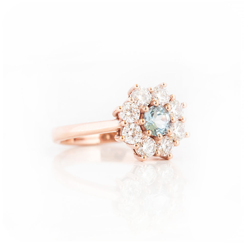 Fleur, a Moissanite and Topaz Flower Cluster Ring