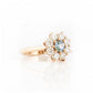 Fleur, a Moissanite and Topaz Flower Cluster Ring