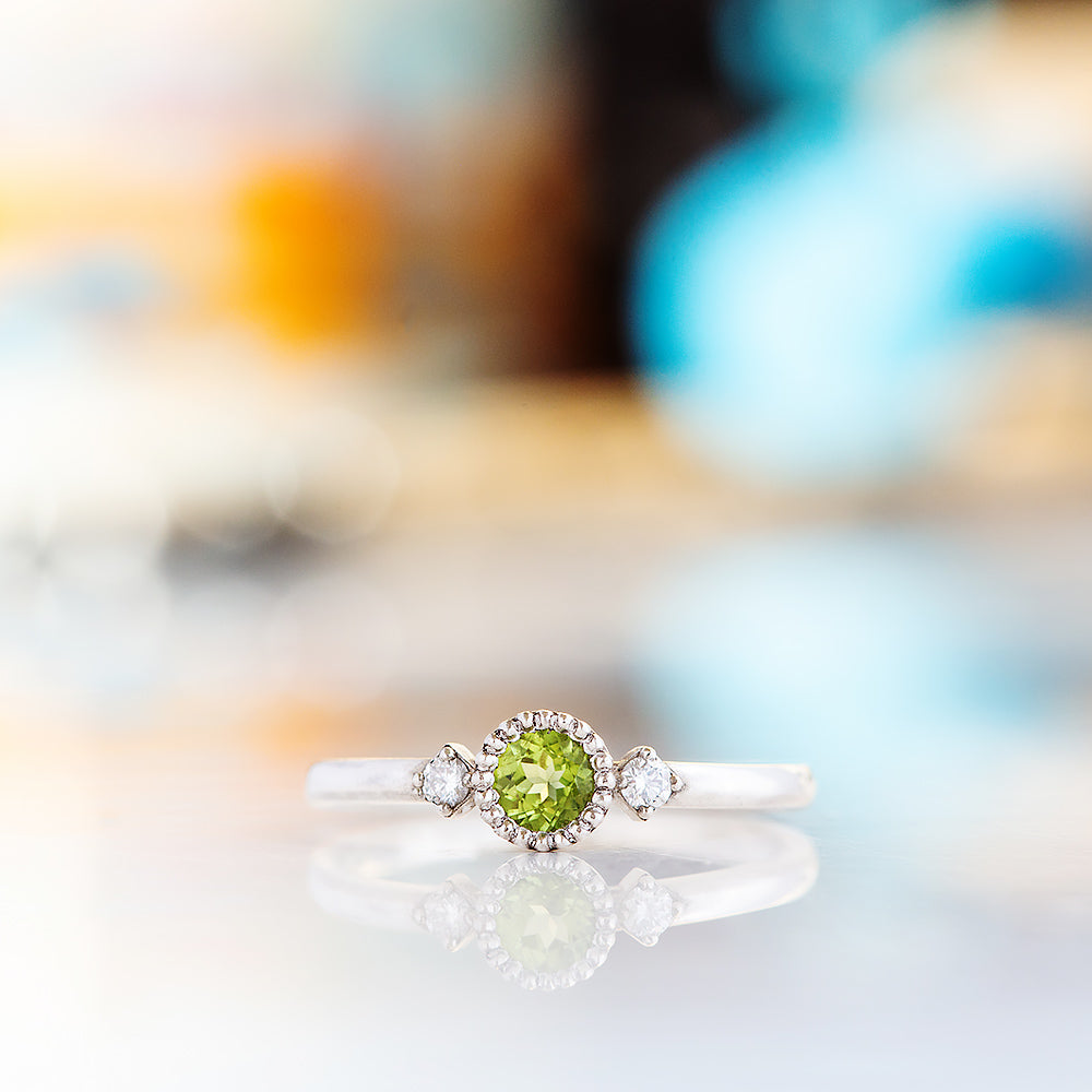 Milly, a Peridot and Lab Diamond Ring