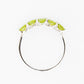 Danelle, a Peridot Half Eternity Trellis Ring