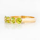Danelle, a Peridot Half Eternity Trellis Ring