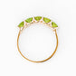 Danelle, a Peridot Half Eternity Trellis Ring