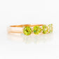Danelle, a Peridot Half Eternity Trellis Ring
