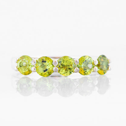 Danelle, a Peridot Half Eternity Trellis Ring