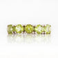Annie, a Peridot Half Eternity Ring