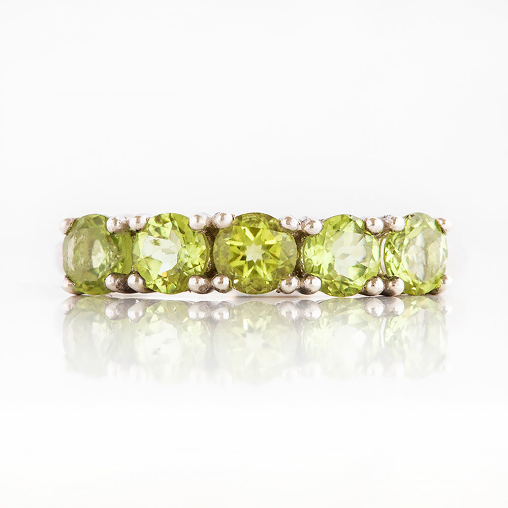Annie, a Peridot Half Eternity Ring