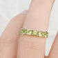 Annie, a Peridot Half Eternity Ring