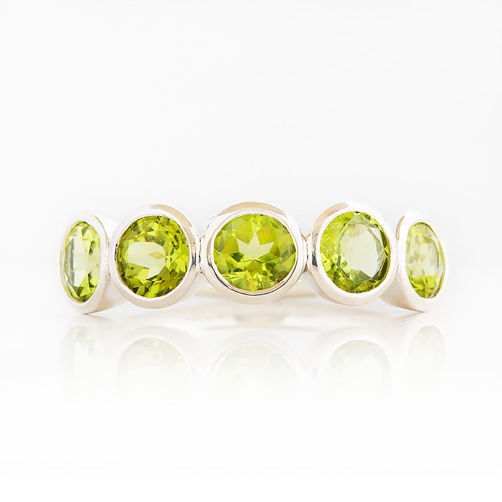 Chie, a Peridot Half Eternity Ring
