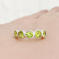 Chie, a Peridot Half Eternity Ring