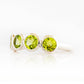 Chie, a Peridot Half Eternity Ring