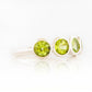 Chie, a Peridot Half Eternity Ring