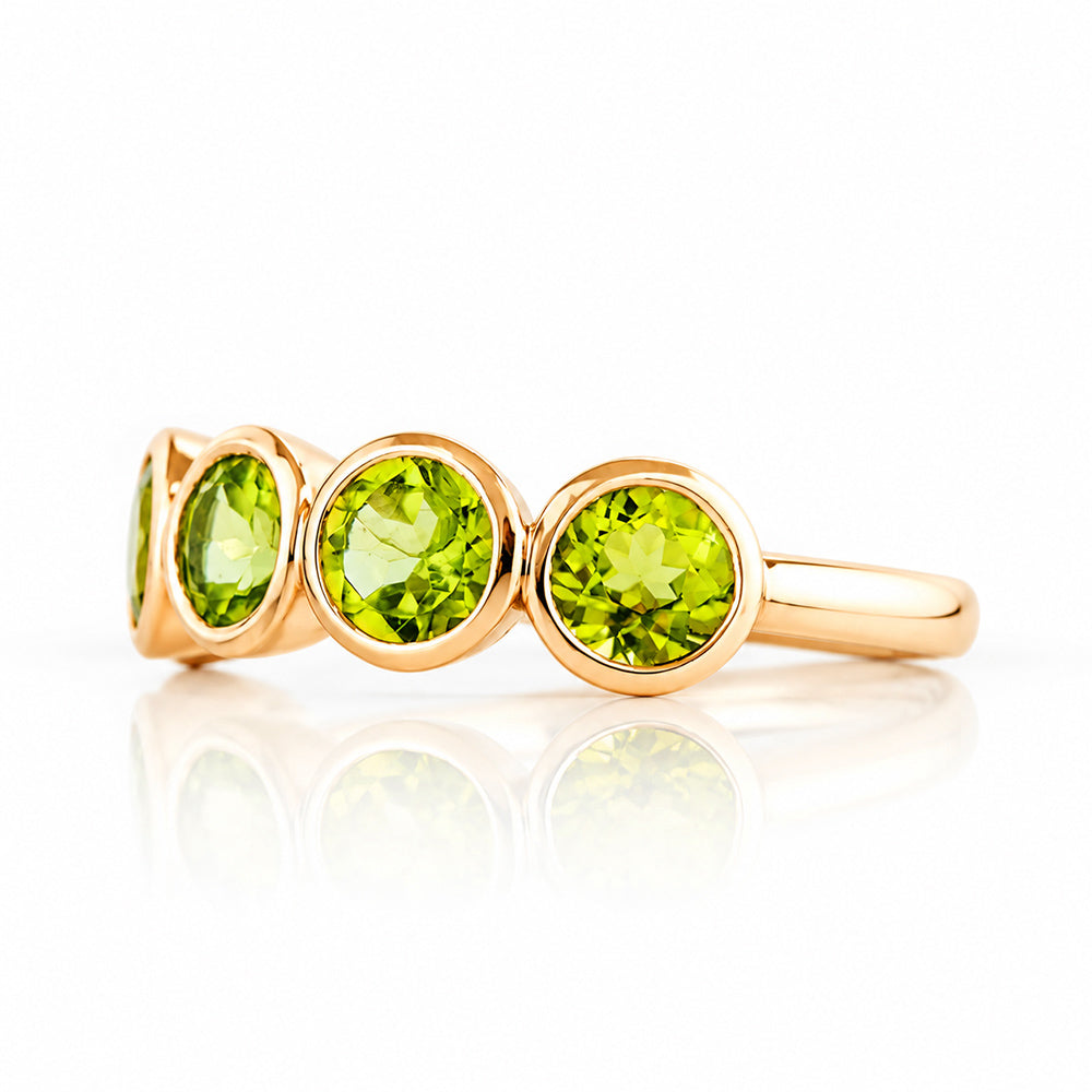 Chie, a Peridot Half Eternity Ring - Victoria's Jewellery