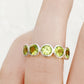 Chie, a Peridot Half Eternity Ring