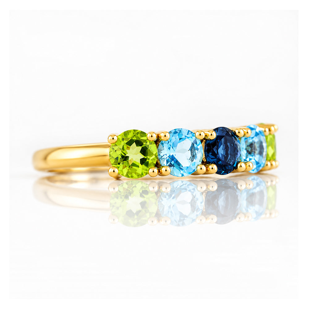 Annie, a Peridot and Topaz Half Eternity Ring - Victoria's Jewellery