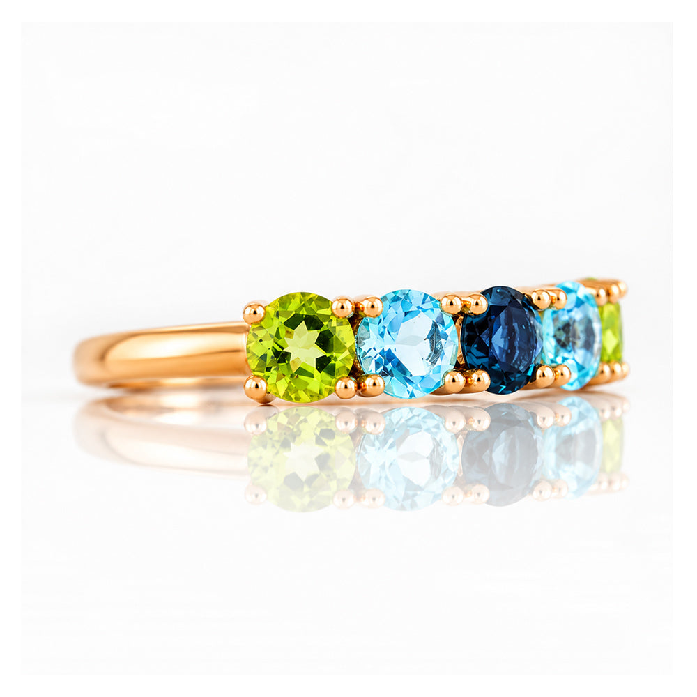 Annie, a Peridot and Topaz Half Eternity Ring - Victoria's Jewellery