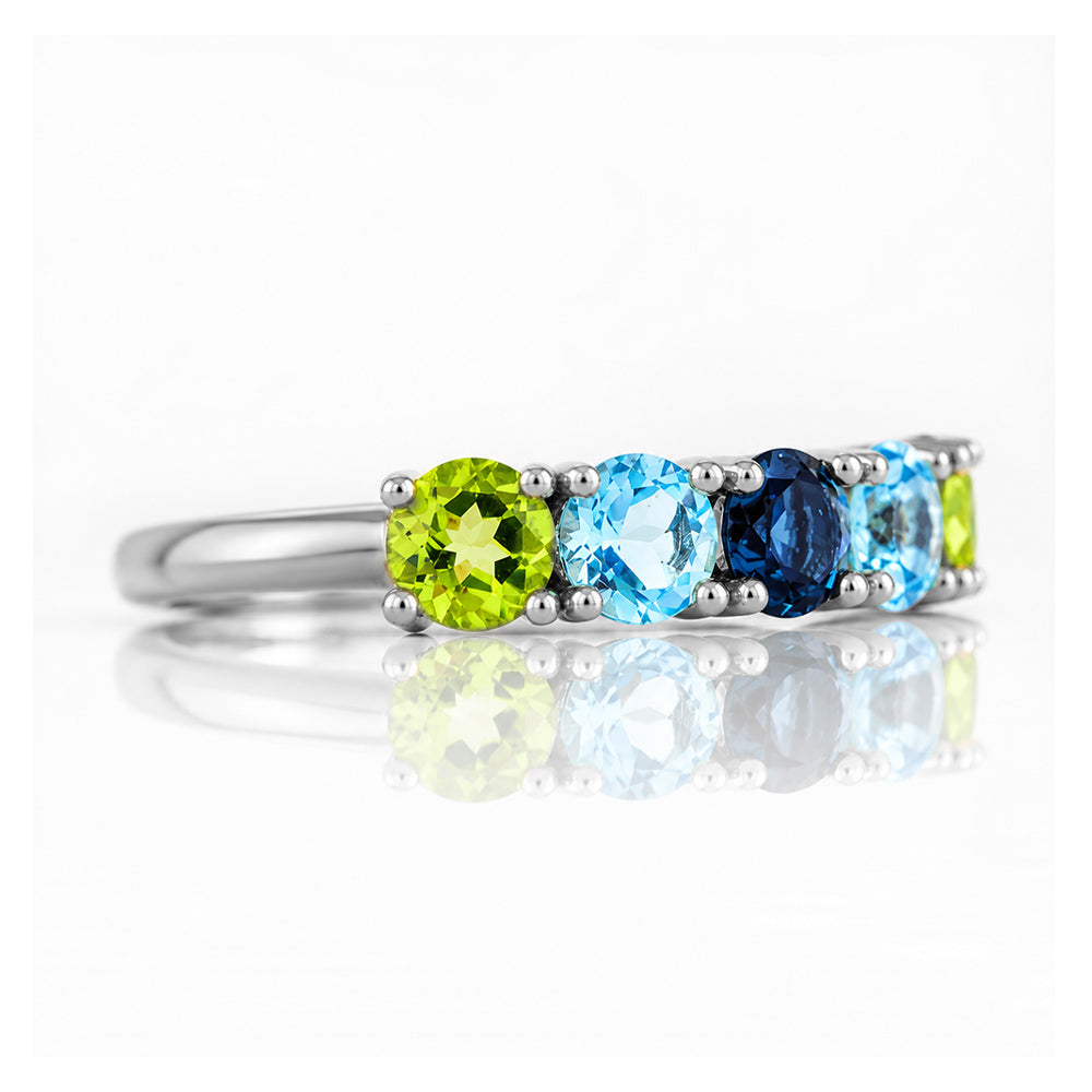 Annie, a Peridot and Topaz Half Eternity Ring - Victoria's Jewellery
