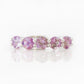 Danelle, a Pink Amethyst Half Eternity Trellis Ring