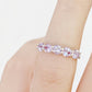 Danelle, a Pink Amethyst Half Eternity Trellis Ring