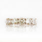 Annie, a Prasiolite Half Eternity Ring