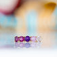 Annie, a Pink Half Eternity Ring - Victoria's Jewellery