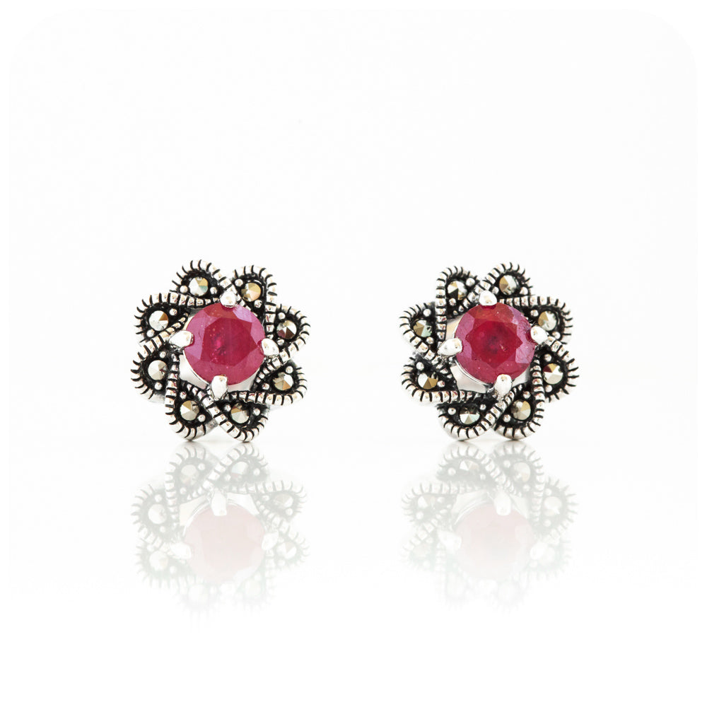 round cut ruby stud earrings in a vintage flower design