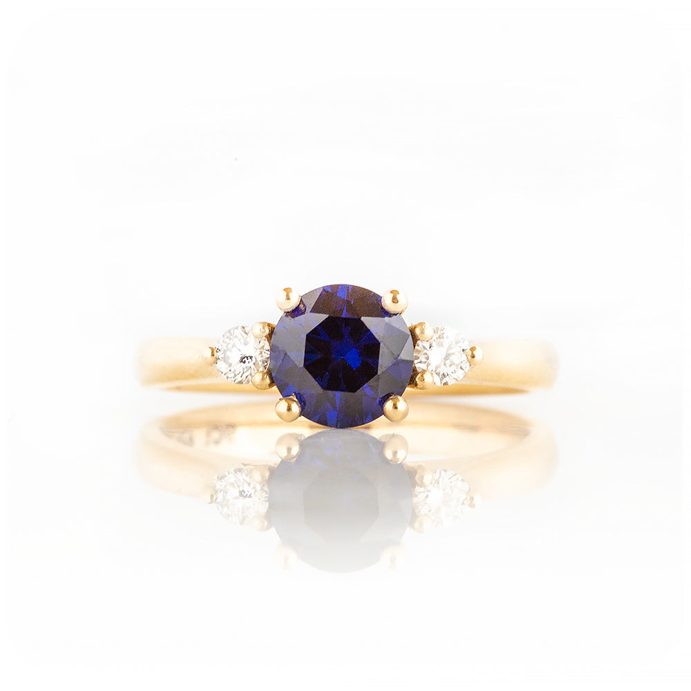 Round cut Lab Sapphire and Diamond Trilogy Engagement Ring in Yellow Gold - Victoria's Jewellery