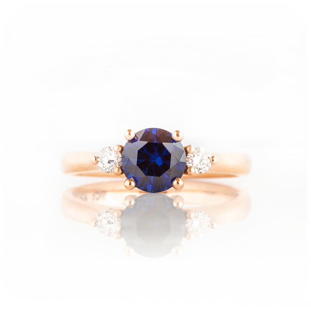 Round cut Lab Sapphire and Diamond Trilogy Engagement Ring in Rose Gold - Victoria's Jewellery