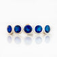 Violet, a Lab Sapphire Bezel Set Half Eternity Ring