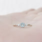 Milly, a Sky Blue Topaz and Lab Diamond Ring